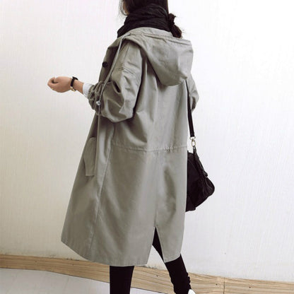 Windproof women's trench coat by BowLift featuring a hood, waterproof outdoor design, in a stylish beige color.