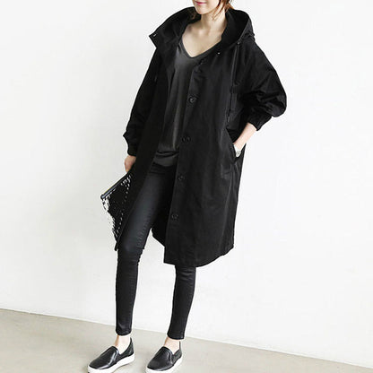 Windproof women's trench coat by BowLift featuring a hood, waterproof outdoor design, and storm-resistant fabric for rainy weather.