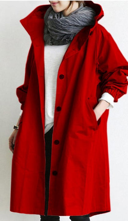 Windproof women's trench coat by BowLift with hood, waterproof outdoor jacket in a stylish design, suitable for rainy weather.