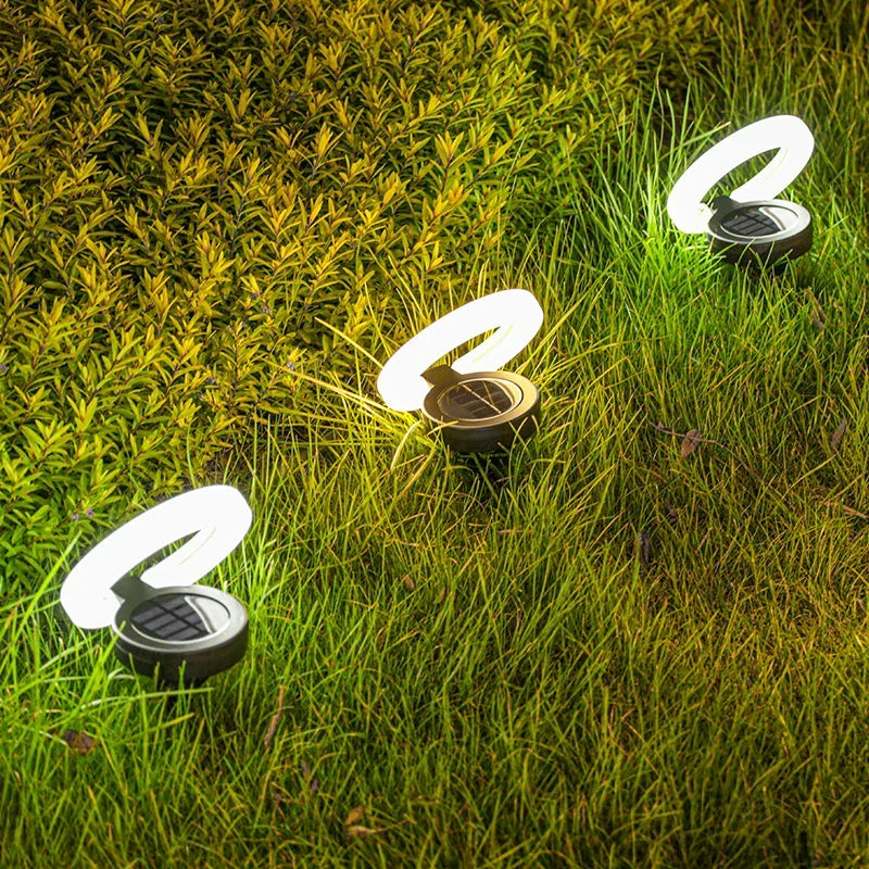 Mivoza solar garden spike light with 360° adjustable head and weatherproof IP65 design, ideal for outdoor ground illumination.