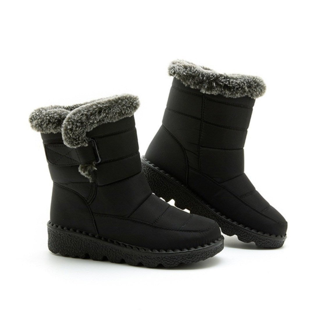 Belro women's waterproof heeled snow boots with durable winter footwear design, suitable for snowy conditions and cold weather.