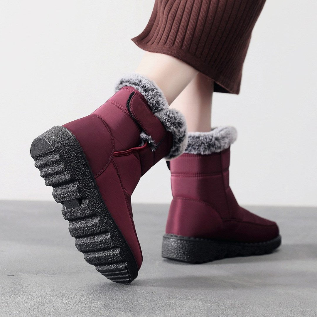 Belro women's waterproof heeled snow boots with cozy lining and durable sole, ideal for winter weather.