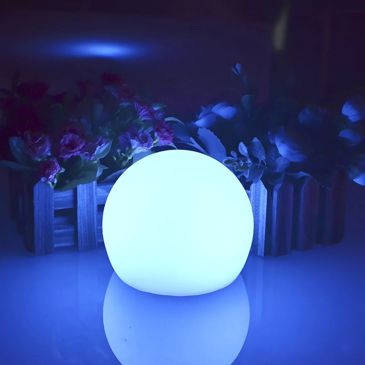 Weatherproof BowLift LumiGlobe solar garden light with spherical design and LED illumination, ideal for outdoor garden decoration.