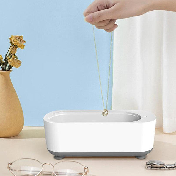 Belro portable ultrasonic jewelry cleaner with digital control and compact design for effective cleaning of jewelry accessories.
