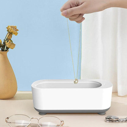 Belro portable ultrasonic jewelry cleaner with digital control and compact design for effective cleaning of jewelry accessories.