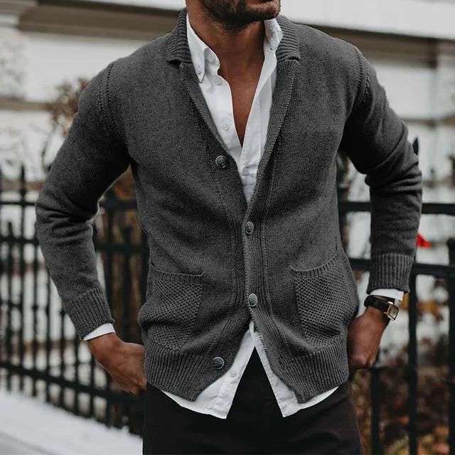 Belro plain automotive cardigan with pockets, featuring a simple design and comfortable fit, displayed in a front view.