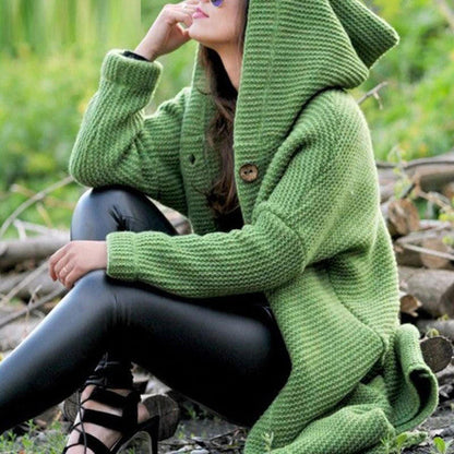 Belro long automotive cardigan, stylish and comfortable, shown draped over a model with pockets and a button-up front.