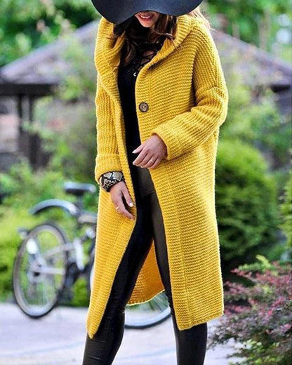 Long Belro automotive cardigan with detailed stitching and textured fabric, designed for stylish comfort and warmth.