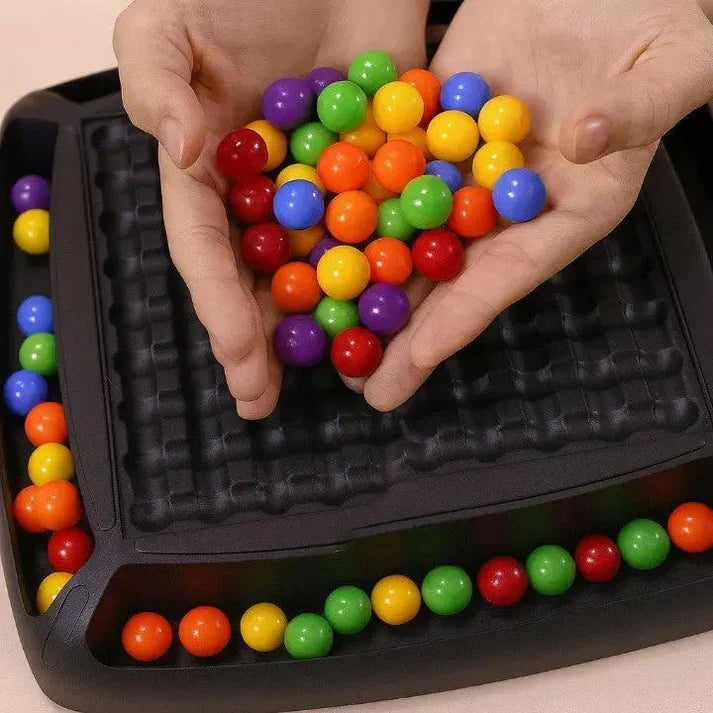 Mivoza marble strategy board game for two players, featuring a wooden game board with marbles and game pieces for concentration and logic.