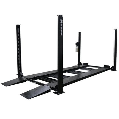 Casavibeo Titan SDPL-8000XLT 4-post lift showing sturdy steel columns and hydraulic arms in a well-lit garage setting.