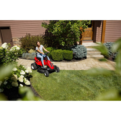 Troy-Bilt TB30B 30-inch riding lawn mower with 10.5 HP Briggs & Stratton engine, shown in a grassy yard.