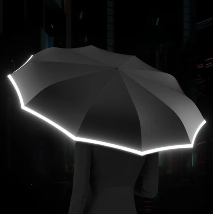 Belro stormproof umbrella with reflective edge, black canopy, and sturdy handle, designed for durability and visibility in bad weather.