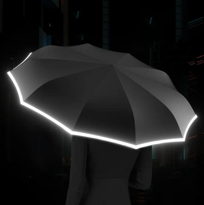 Belro stormproof umbrella with reflective edge, black canopy, and sturdy handle, designed for durability and visibility in bad weather.