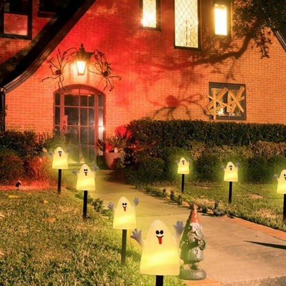 Lighted Halloween pumpkin and ghost solar decor set by Belro, perfect for spooky seasonal umbrella accents.