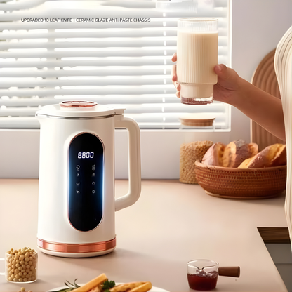 Belro nut milk maker on kitchen countertop, showing sleek design with control panel and stainless steel blending chamber.