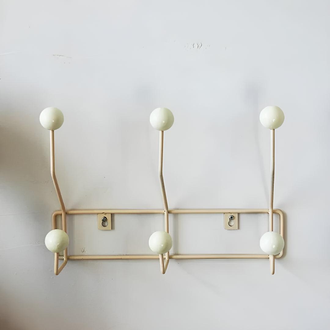 Mid-century wall coat rack by Mivoza with three hooks, vintage style hallway organizer for entryway home storage.