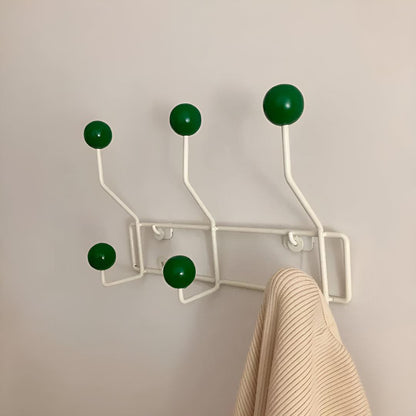 Mid-century wall coat rack by Mivoza with three hooks, vintage style hallway organizer for entryway storage and decor.