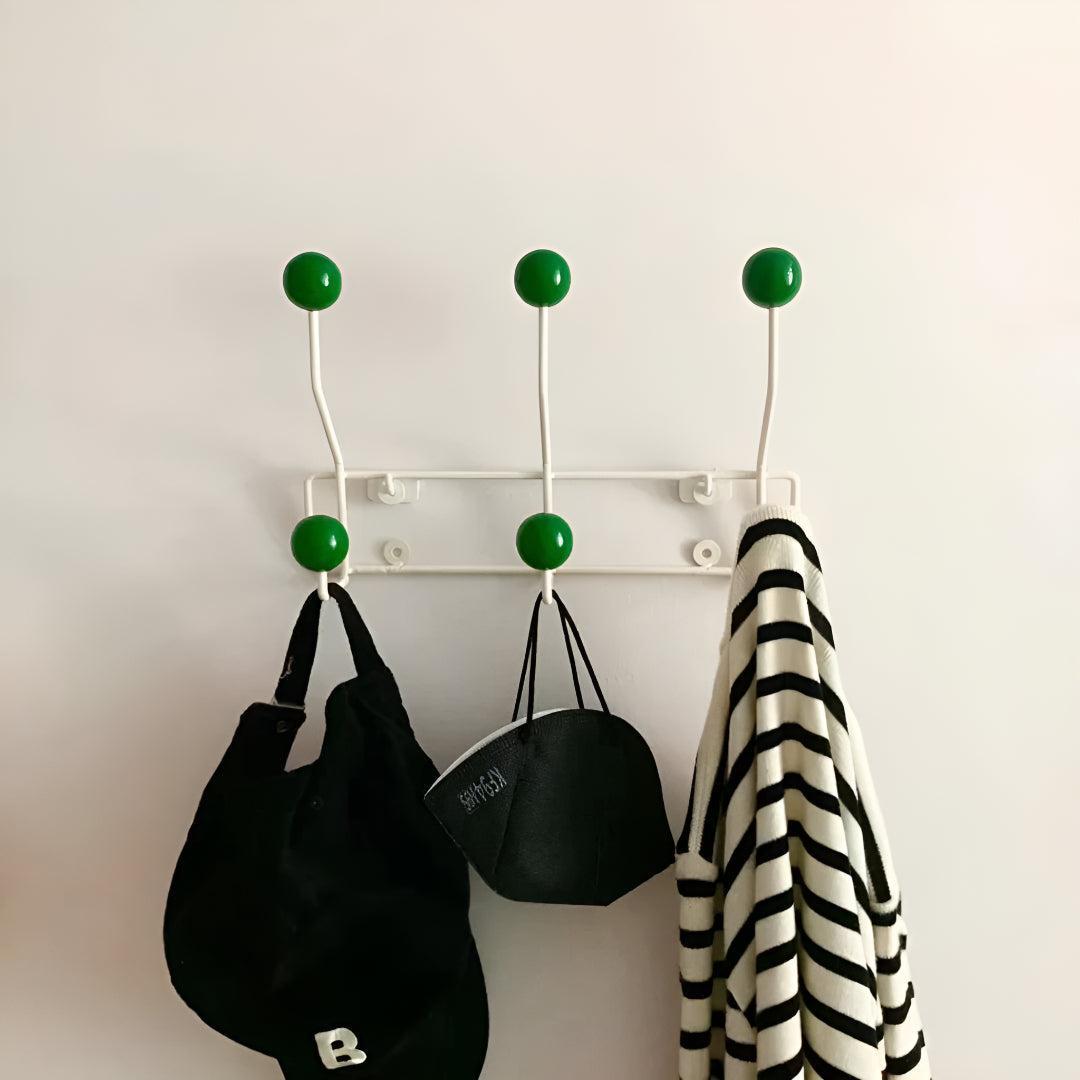Mid-century wall coat rack with three hooks by Mivoza, perfect for hallway organization and stylish home entryway decor.