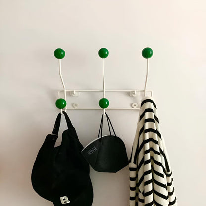Mid-century wall coat rack with three hooks by Mivoza, perfect for hallway organization and stylish home entryway decor.