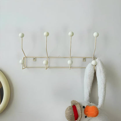 Vintage mid-century wall coat rack with three hooks, stylish hallway organizer for entryway storage by Mivoza.