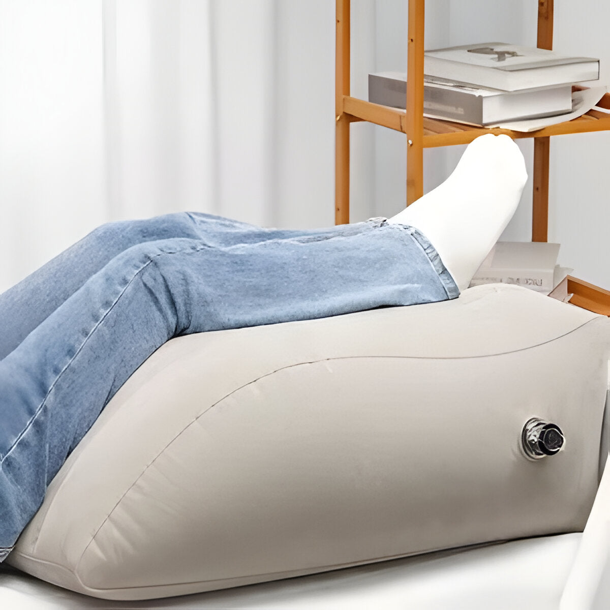 Belro inflatable leg-support cushion for back braces, shown inflated with adjustable straps for comfort and support.