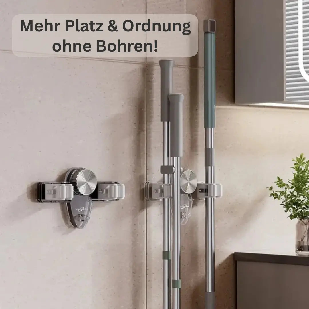 Mivoza wall-mounted broom and mop holder with four hooks, self-adhesive design for space-saving cleaning tool storage.