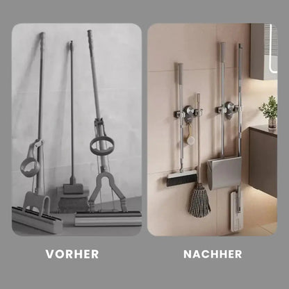 Mivoza wall-mounted broom and tool holder with four hooks, self-adhesive design, for space-saving cleaning tool organization.