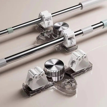Mivoza space-saving wall-mounted broom and tool holder with four hooks for organizing cleaning tools without drilling.