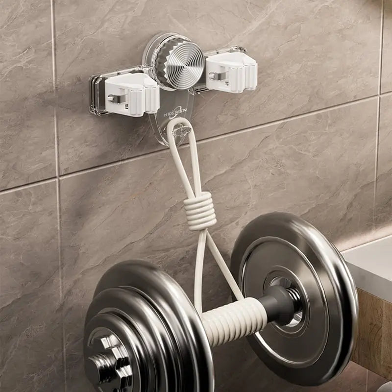 Mivoza wall-mounted broom and mop holder with four hook slots, adhesive design for space-saving cleaning tool organization.