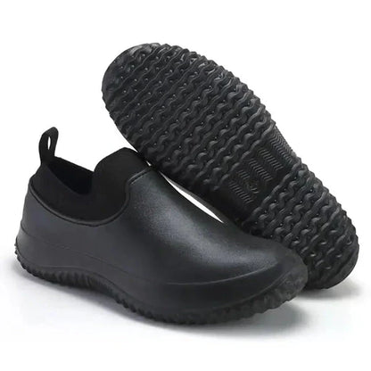 Black Belro waterproof slip-on work shoes, durable footwear designed for safety and comfort in industrial environments.