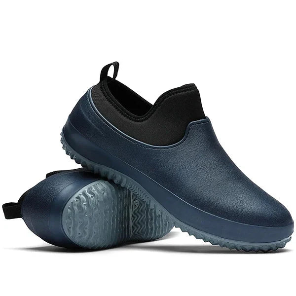 Belro waterproof slip-on work shoes in blue, durable footwear designed for safety and comfort in work environments.