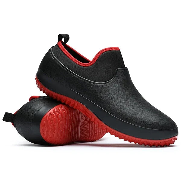 Red Belro waterproof slip-on work shoes, durable footwear designed for safety and comfort in work environments.