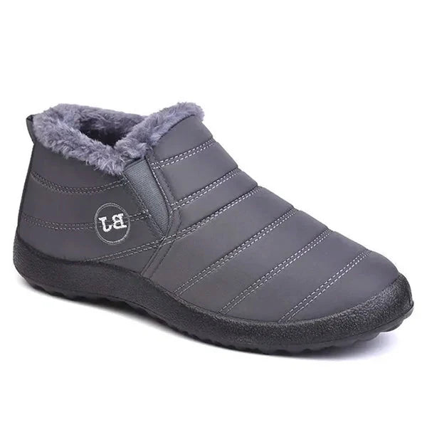 Gray waterproof winter slip-on boots by Belro designed for snow, with insulated lining and durable rubber soles.