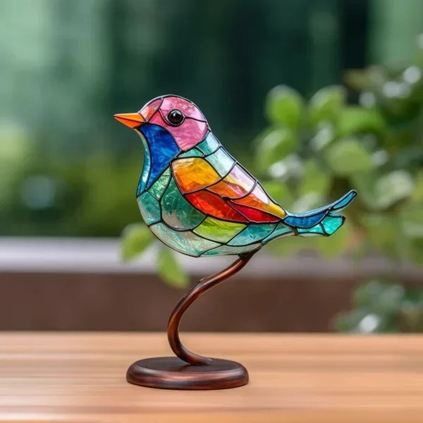 Decorative acrylic bird ornaments on branch, designed by BowLift, for desktop decor, with a stained glass-like appearance and warm ambiance.