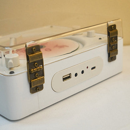 Belro retro CD player with circular control panel and vintage design, featuring speakers on either side.