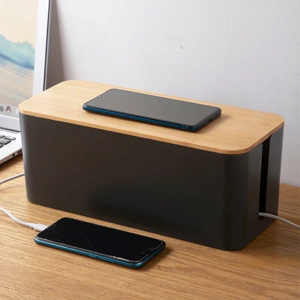 Belro wire organizer box for electronics, featuring compartments for cable storage and management, shown in the image.