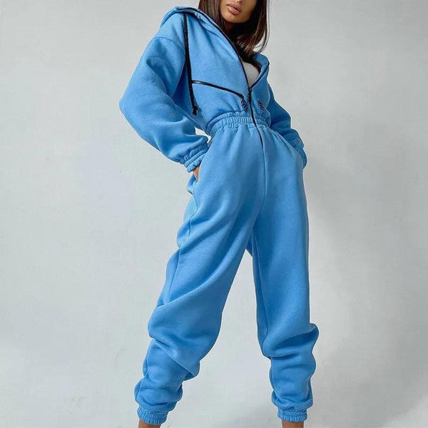 Belro basic hooded jumpsuit made of soft sleepwear fabric, featuring a hood, long sleeves, and a relaxed fit for comfortable loungewear.