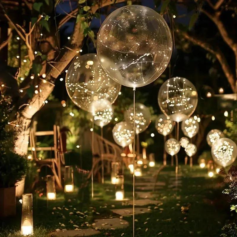 Set of 10 warm glowing LED balloons by Mivoza, reusable party decorations with soft light for celebrations.