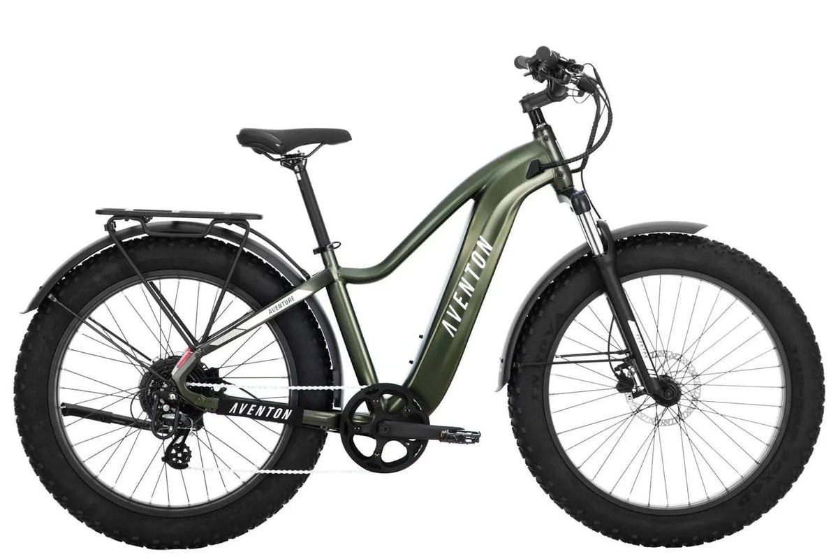 Aventon Aventure 2 electric bike with black frame and thick tires, parked on a city street