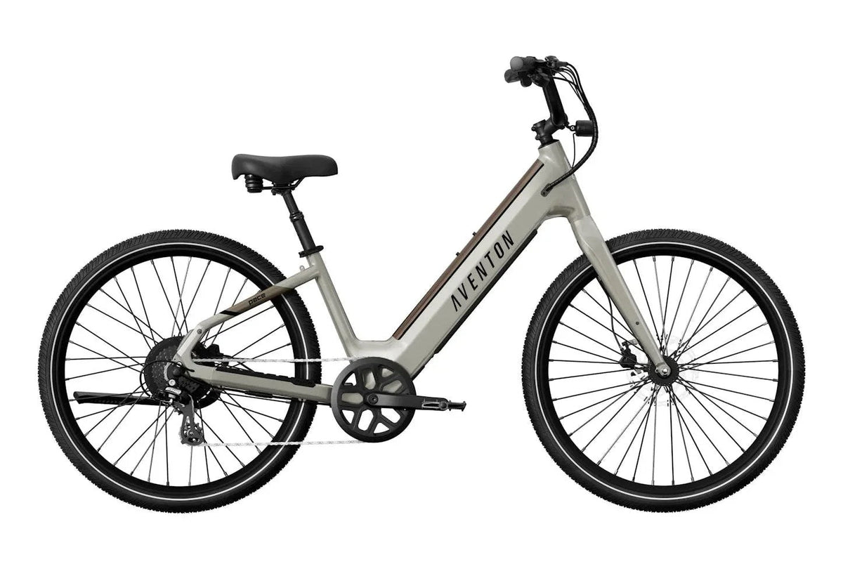Aventon Pace 4 Steps Throughs bicycle with sleek frame and gear system, shown from side view in this Casavibeo product image.