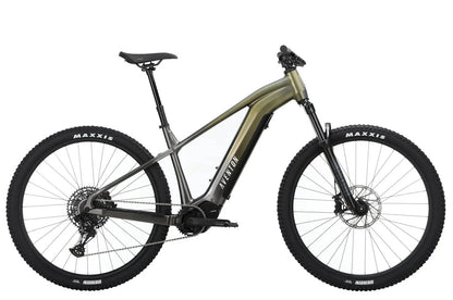 Casavibeo Aventon Ramblas electric mountain bike outdoors, showing its frame, tires, and handlebars in a natural riding setting.