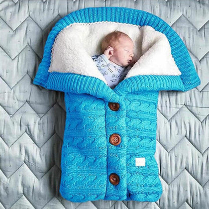 Soft Belro baby blanket in cozy fabric, featuring a gentle pastel design, perfect for nurseries and baby cribs.
