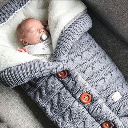 Soft Belro baby blanket featuring a cozy, plush fabric in pastel colors, perfect for nursery bedding and cuddly comfort.