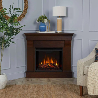 Casavibeo Real Flame Chateau Corner Electric Fireplace showing a cozy, modern corner fireplace with realistic flame effects and wood mantel