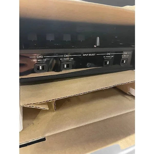 Used Pioneer DJ DDJSX2 DJ controller with jog wheels, mixer, and controls for professional DJ mixing setup.