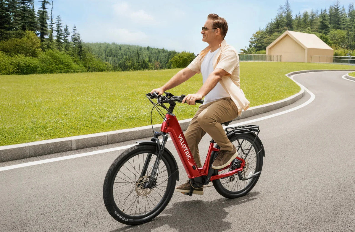 Casavibeo Velotric Discover 2 eBike with sleek frame and battery, ready for outdoor riding on a sunny day.