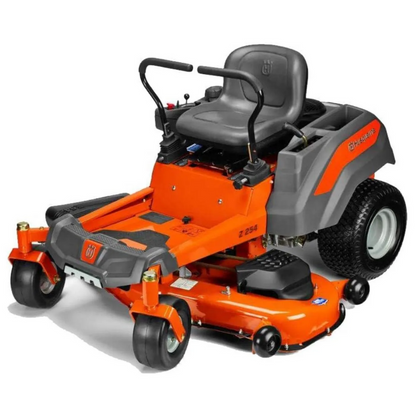 Husqvarna Z254 23HP Kawasaki zero-turn lawn mower with large cutting deck and robust engine, shown in a natural outdoor setting.