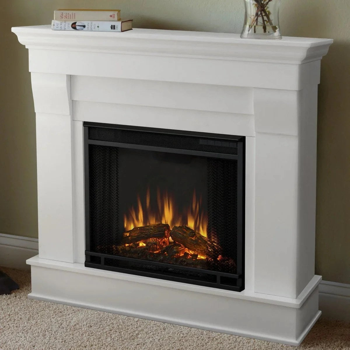 Casavibeo Real Flame Chateau Electric Fireplace with realistic flame effect and classic design, mounted against a neutral wall.