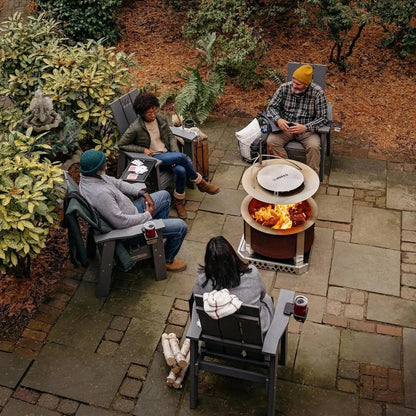 Casavibeo Breeo X Series 24 smokeless fire pit showing a circular steel fire pit with a modern design and surrounding outdoor seating.