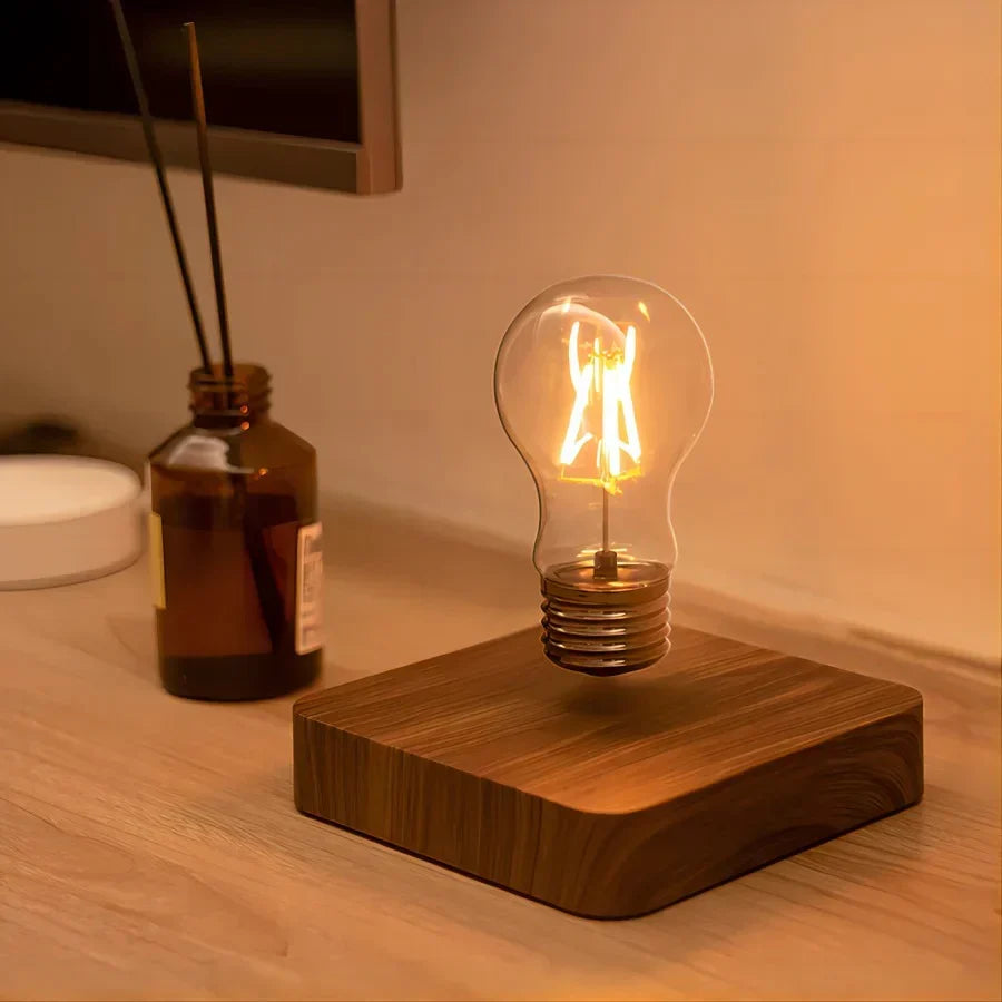 Belro magnetic levitating LED light bulb floating above a base, modern home and garden outdoor decor, illuminated and eye-catching.
